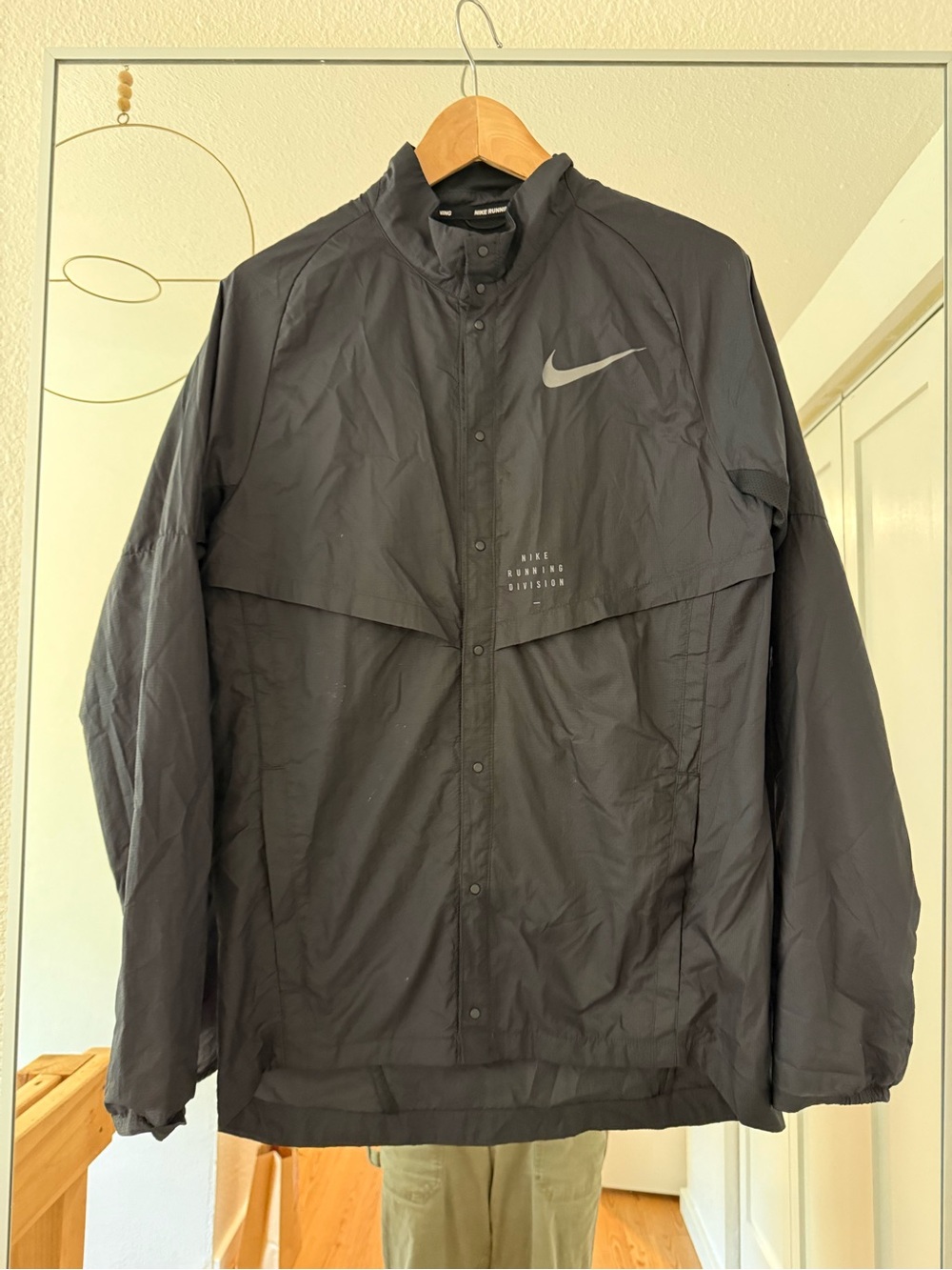 Nike Black Lightweight Windbreaker Jacket with Reflective Swoosh